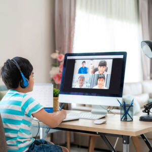 Focused child attending an online class
